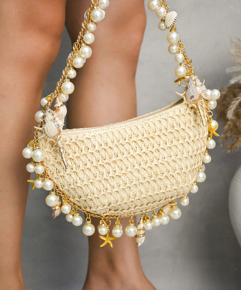 Half moon pearl shell straw bag